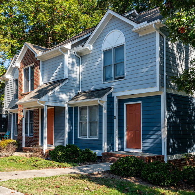  Trails at Southpoint Glen - Apartment Facade with Green Landscape